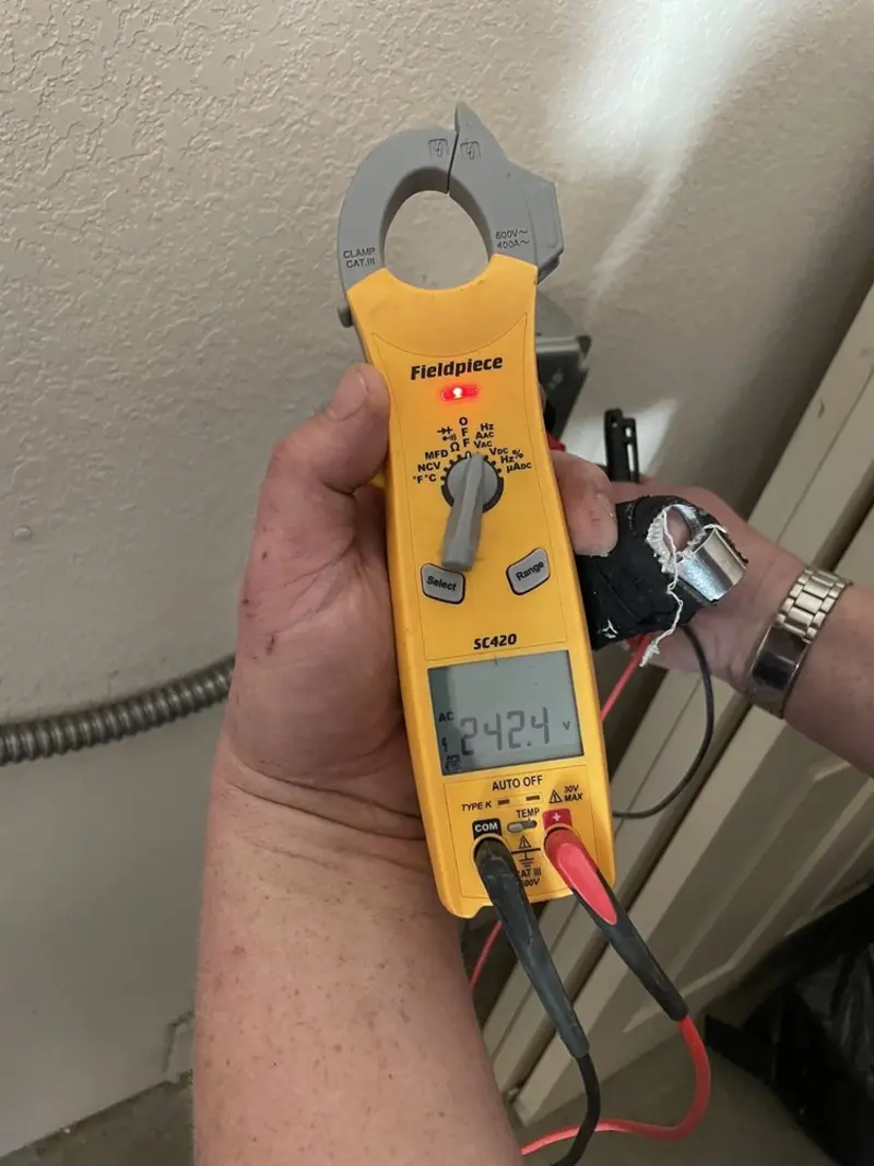 Voltage testing with clamp meter during Generator Installation in Oakland
